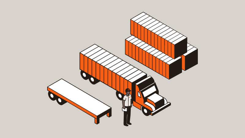 person standing in front of different intermodal owned equipment